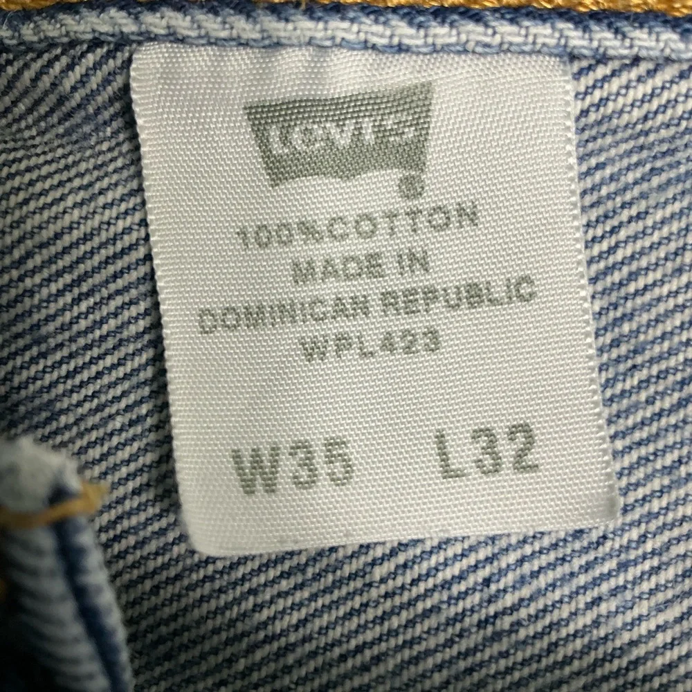 Vintage Levi’s 501XX button fly straight leg 90s medium wash jeans 34 x 29